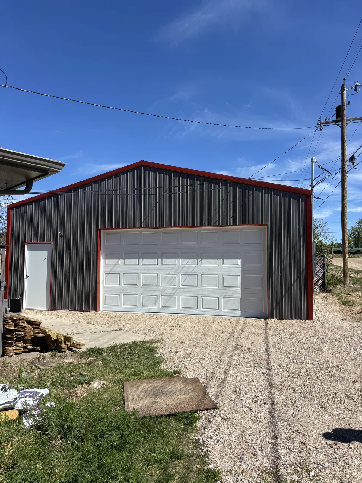Completed metal pole barn and shop building in southeast Wyoming